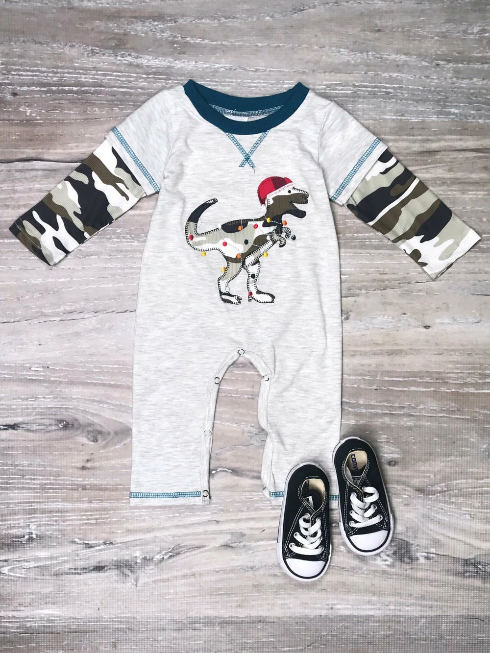 Sydney So Sweet Dino Christmas Lights Camo Raglan Boys Christmas Baby Romper 1 Sydney So Sweet Dino Christmas Lights Camo Raglan Boys Christmas Baby Romper