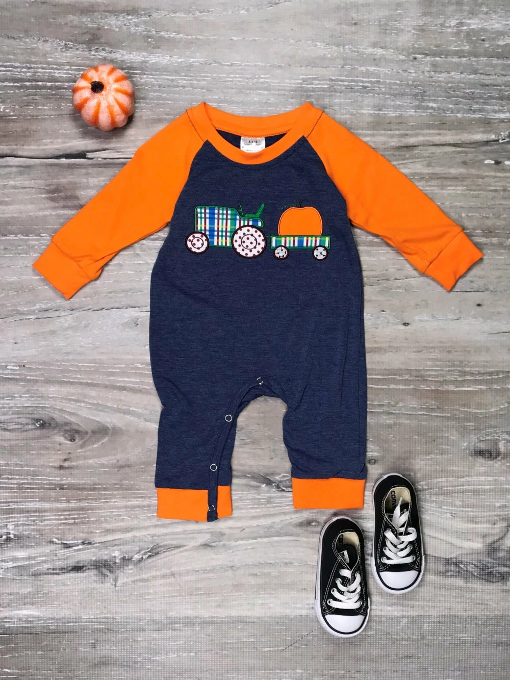 Sydney So Sweet Baby Boutique Tractor Pull Pumpkin Orange & Blue Long Sleeve Baby Romper 1 Sydney So Sweet Baby Boutique Tractor Pull Pumpkin Orange & Blue Long Sleeve Baby Romper